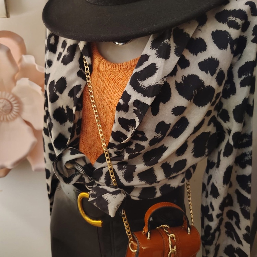 Leopard Print Blazer with Orange Top and Black Hat
